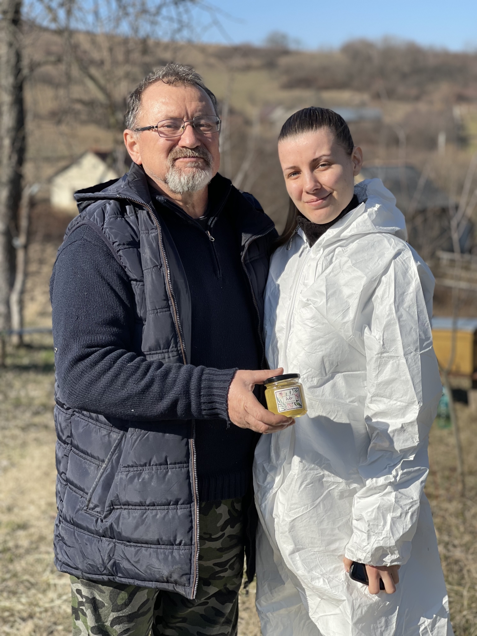Nistor Fanel and Velena Nikolova at the family beehives in Transylvania, 2022
