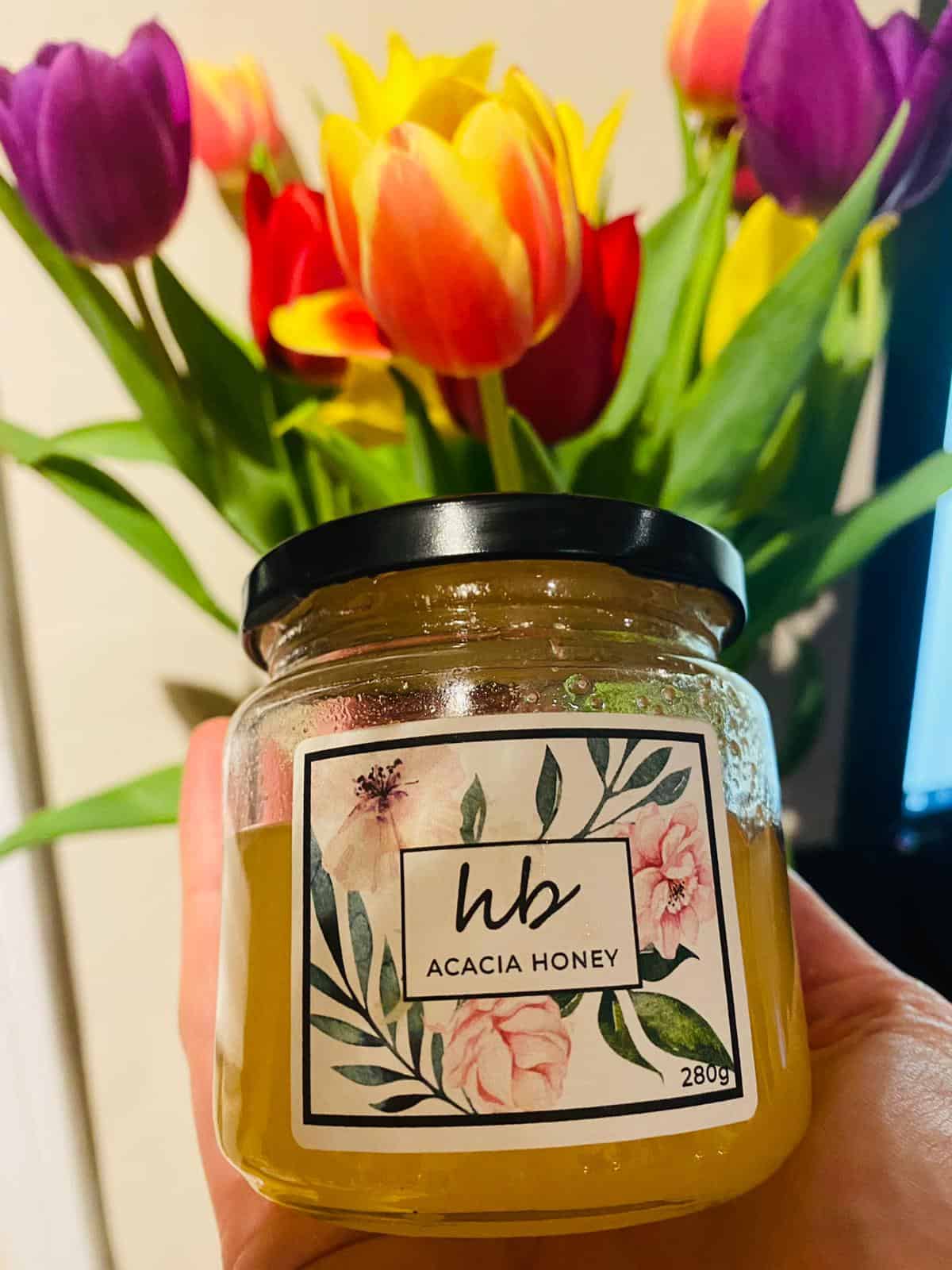 HoneyBee and Co. honey jar gift set showing the artisanal hand-labelled glass jars and natural golden colour of raw cold-extracted honey