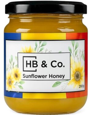 Jar of HoneyBee & Co. Sunflower Honey 280g with a bright golden colour and floral Union Jack label design.