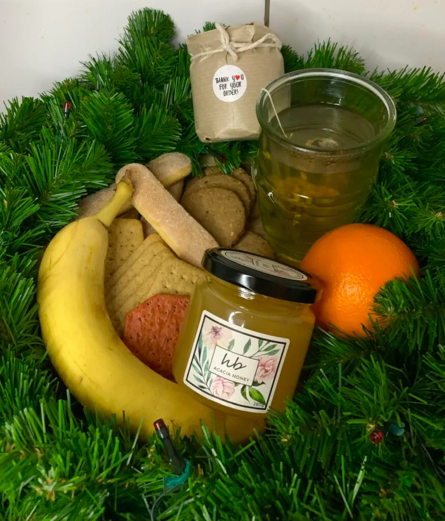 Discover the Potential Honey Side Effects 3 Basket of Fruits with Honey Jars