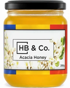 Jar of HoneyBee & Co. Acacia Honey 280g with a clear golden colour and floral label design.