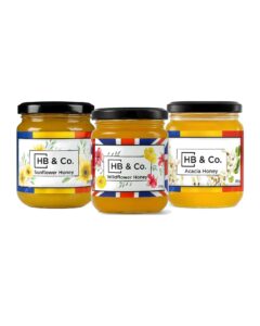 Vasetti di miele di girasole, di fiori selvatici e di acacia.